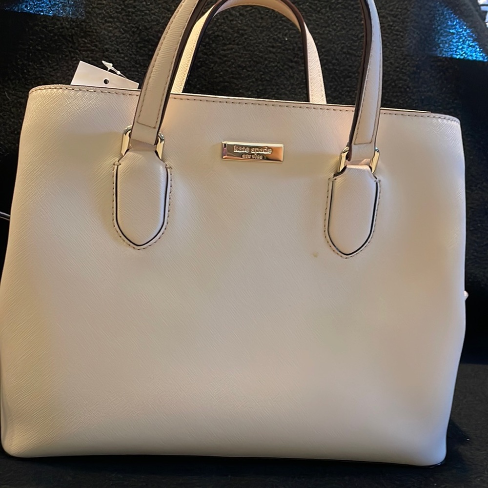 Kate Spade bag light pink brand new w/tag.